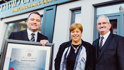 David, Joy and Andrew Crymble outside David Crymble & Sons